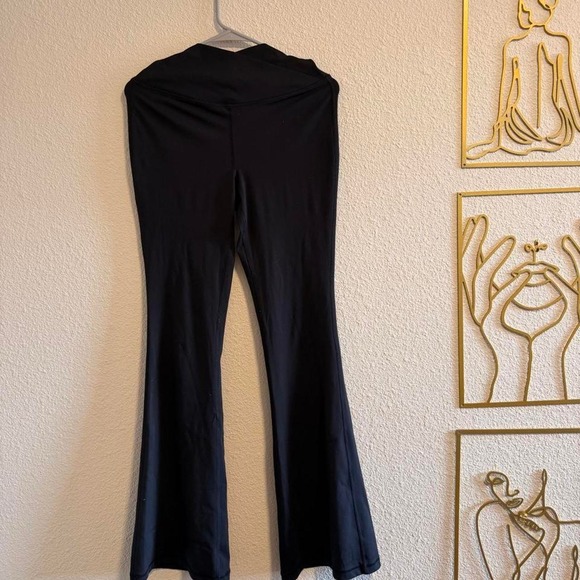 Pants - Black flare polyester & spandex pants in a M